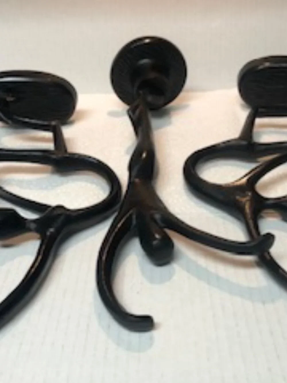 Three dancers female cast metal sculptures designed by Bodrul Khalique for IKEA
